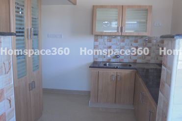 Nexa - L Shaped Modular Kitchen Design in Light Brown with Membrane Laminate  Veneer Finish Options - HSV-LSK-2305