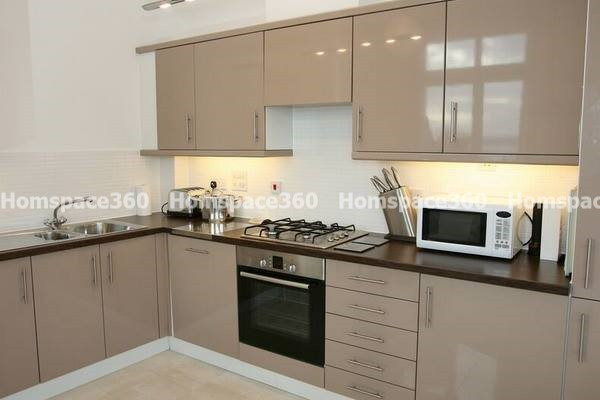 Nexa - L Shaped Modular Kitchen Design in Light Grey with Membrane Laminate  Acrylic Lacquered Glass Finish Options - HSV-LSK-1068